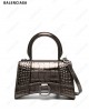 Hourglass XS crocodile-embossed tote bag