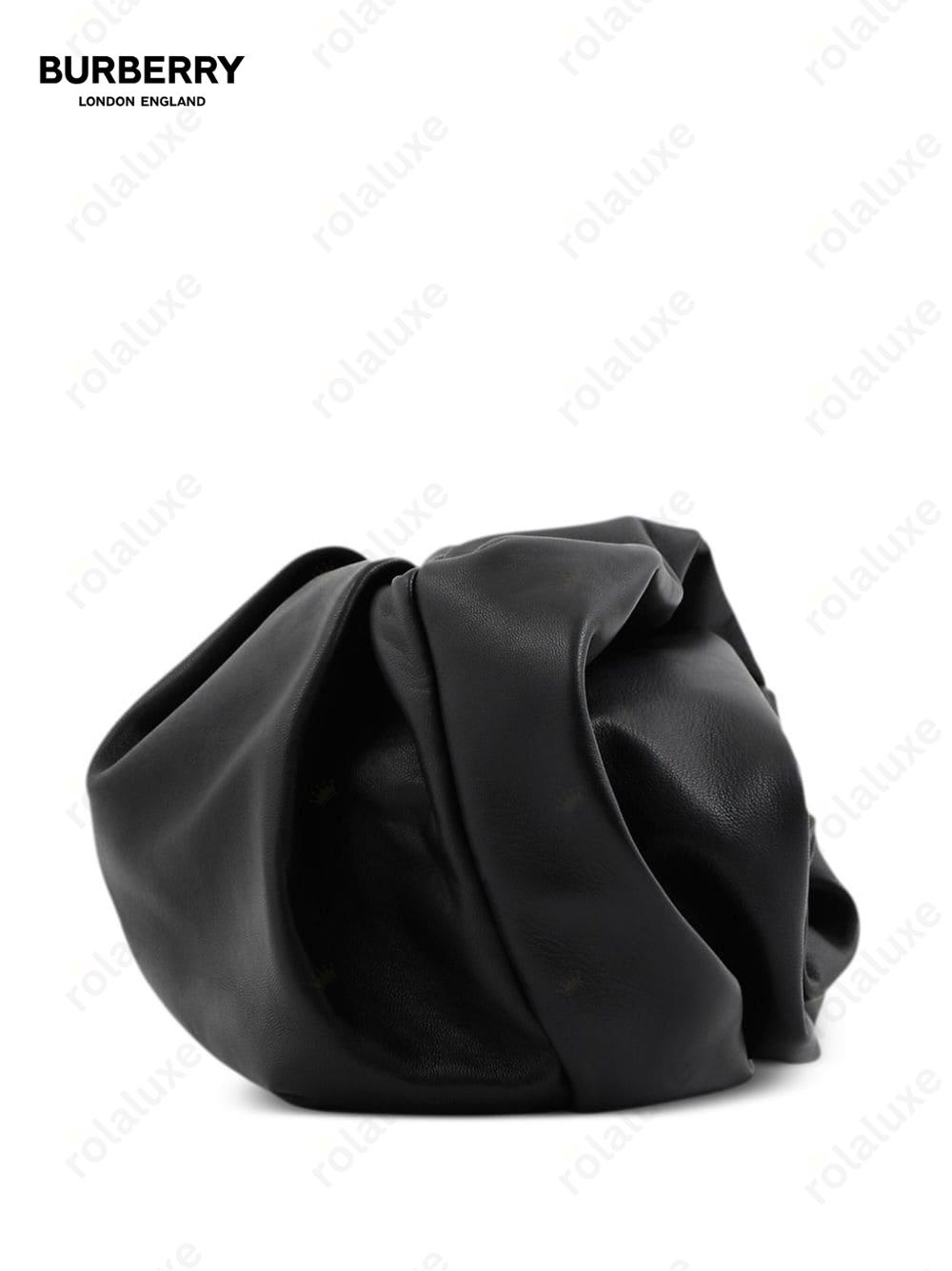 slouch-body leather clutch bag