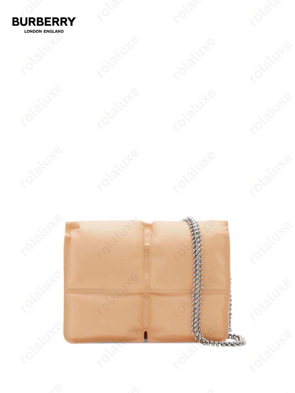 Snip quilted crossbody bag