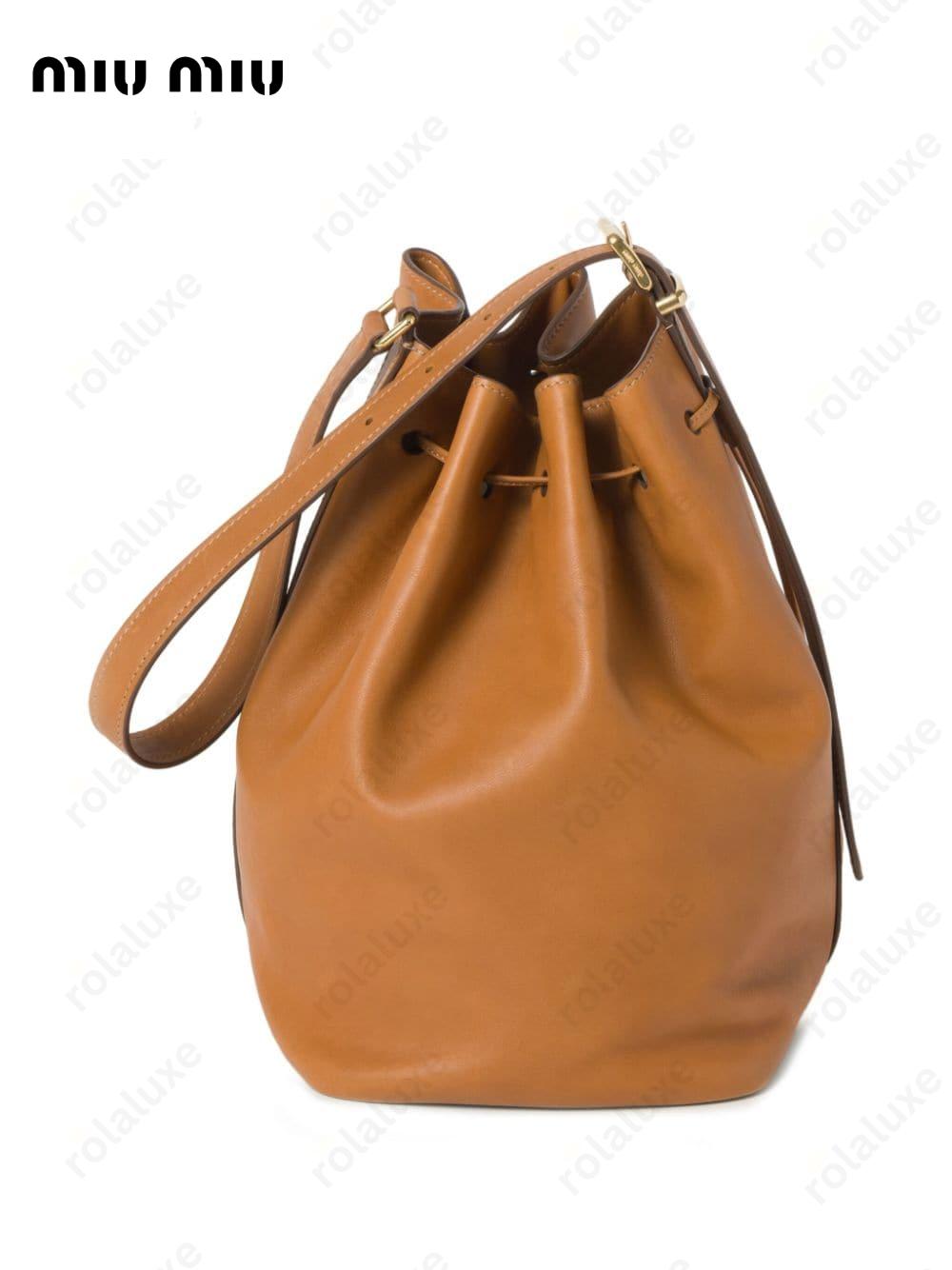 logo-embossed leather bucket bag