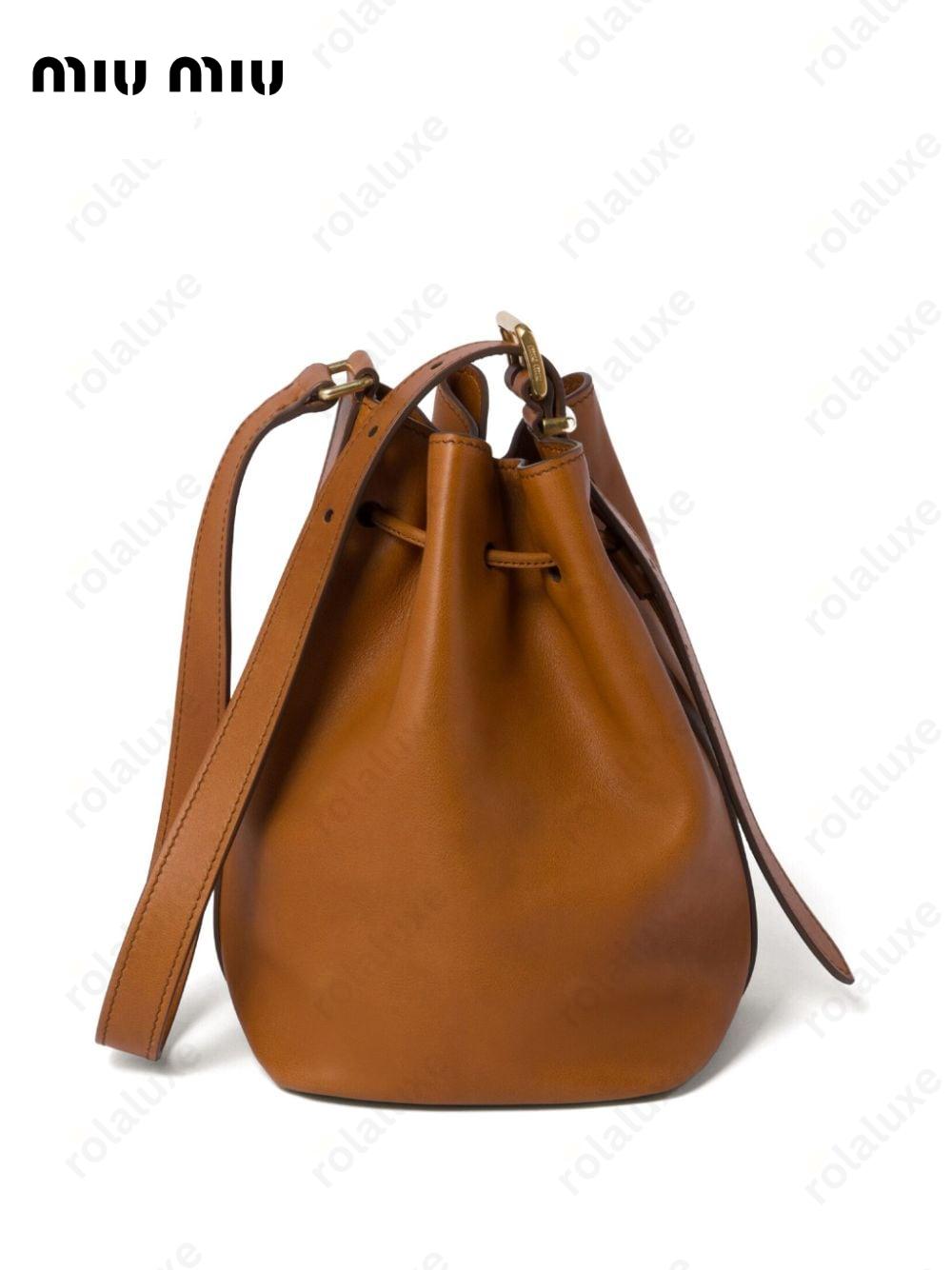 logo-embossed leather bucket bag