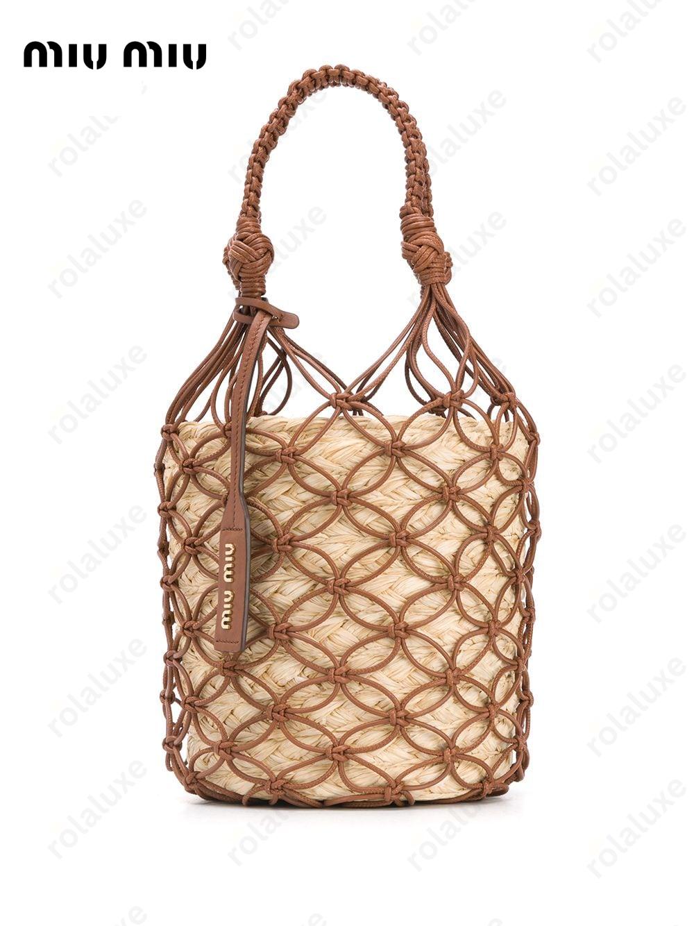 netted straw bucket bag