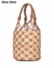 netted straw bucket bag