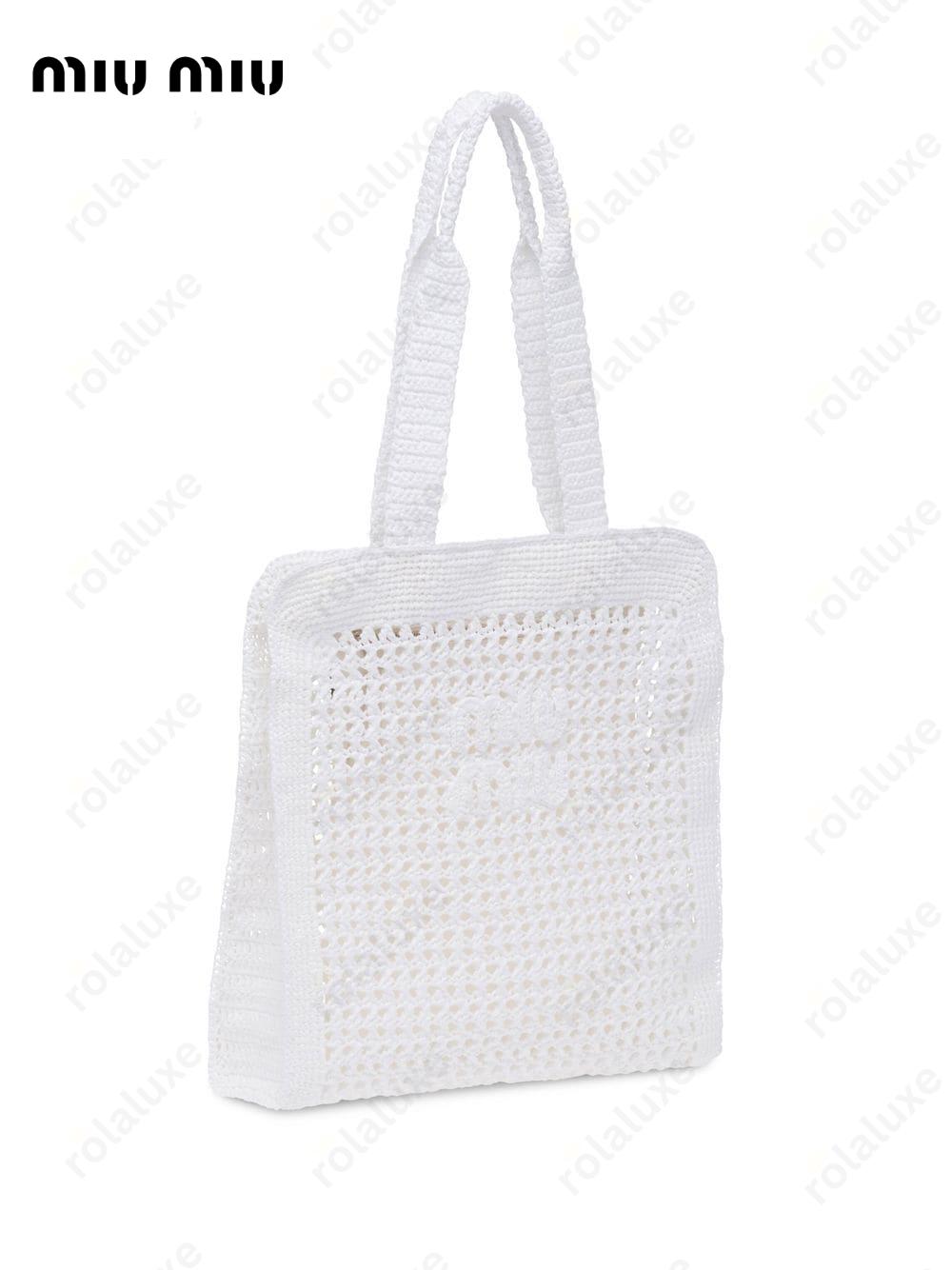 interwoven straw tote bag