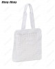 interwoven straw tote bag