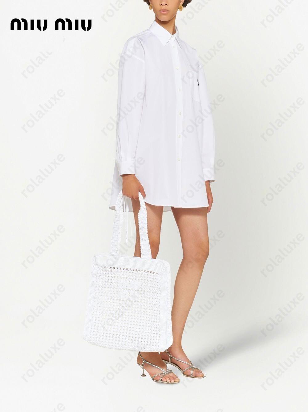 interwoven straw tote bag