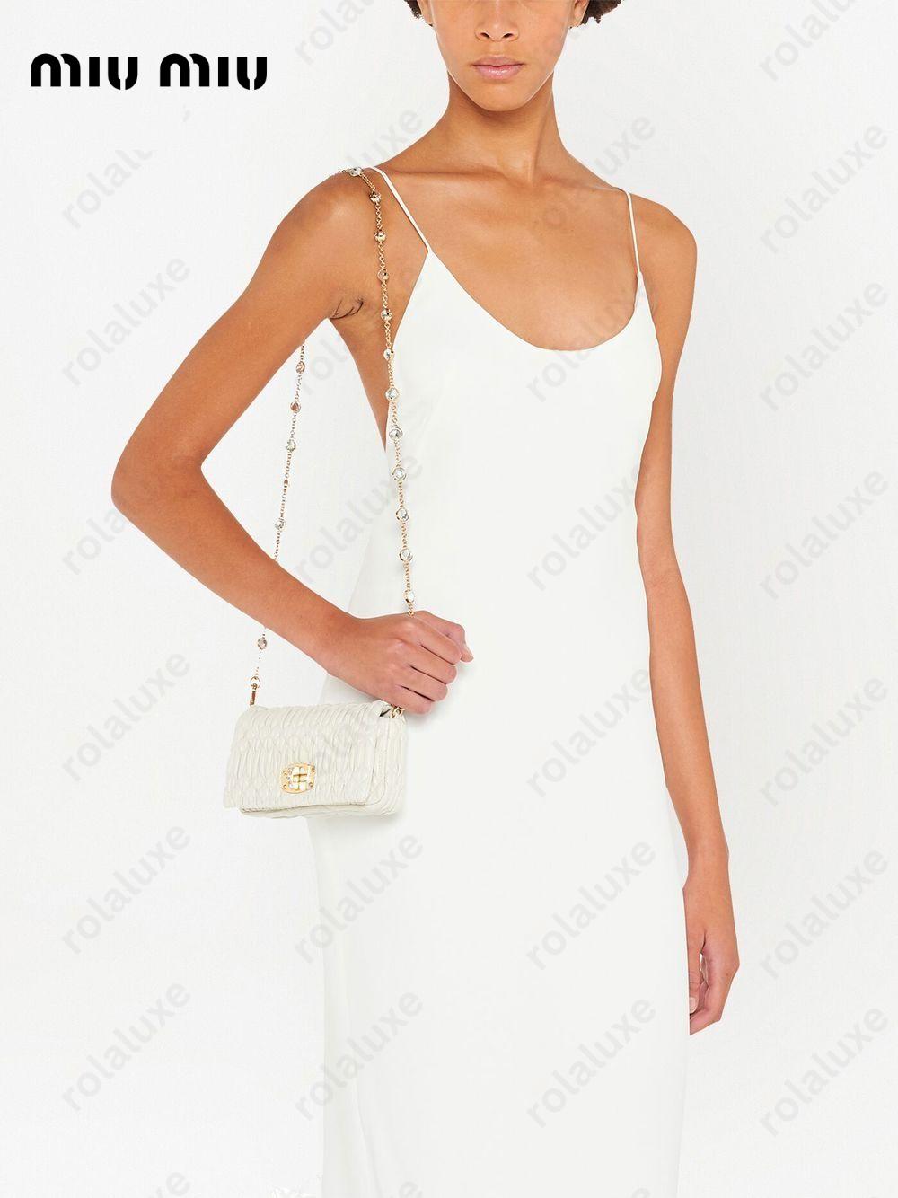 matelassé embellished shoulder bag