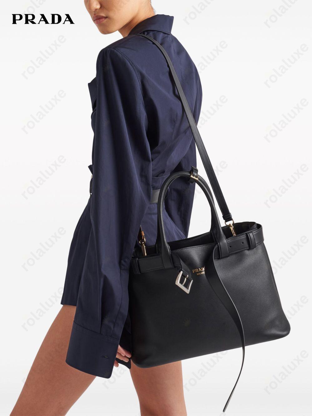 large belted leather handbag