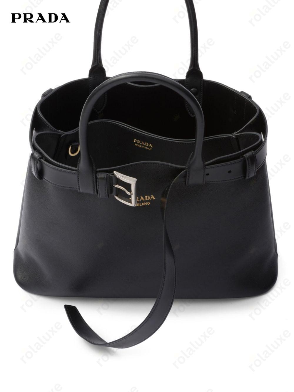 large belted leather handbag