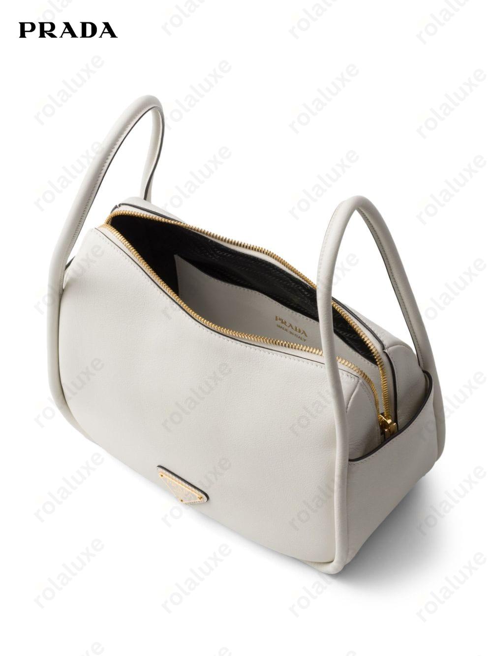 logo hardware leather bag