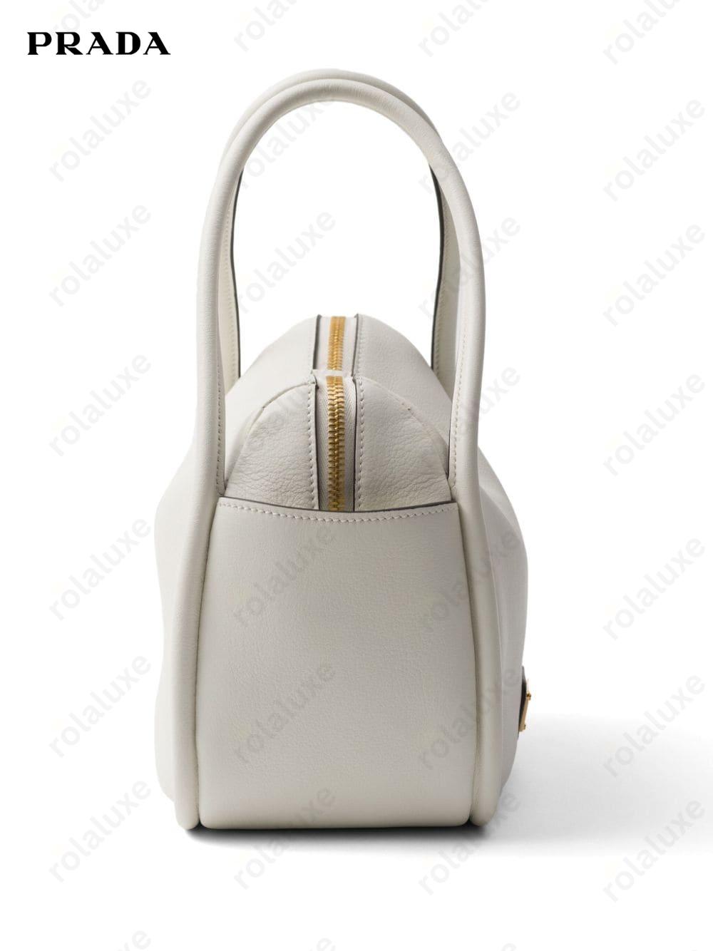 logo hardware leather bag