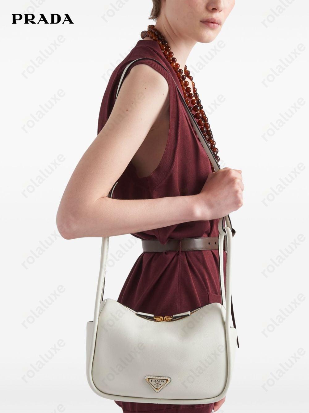 logo hardware leather bag