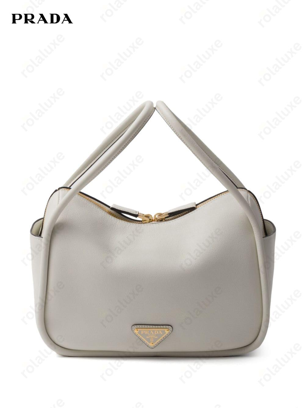 logo hardware leather bag