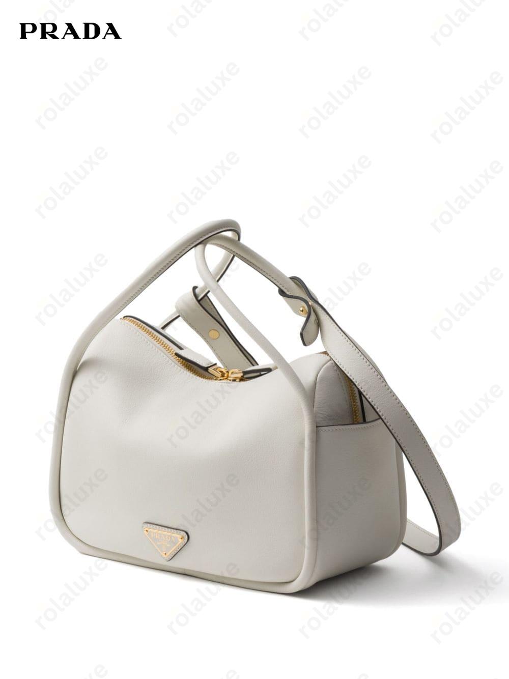 logo hardware leather bag