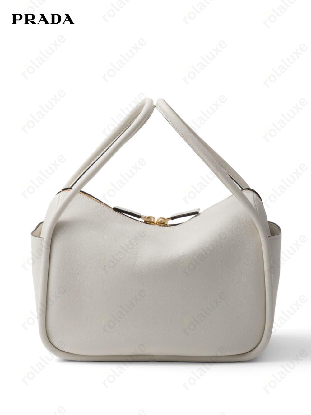 logo hardware leather bag