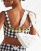 Triangle logo-embroidered shoulder bag